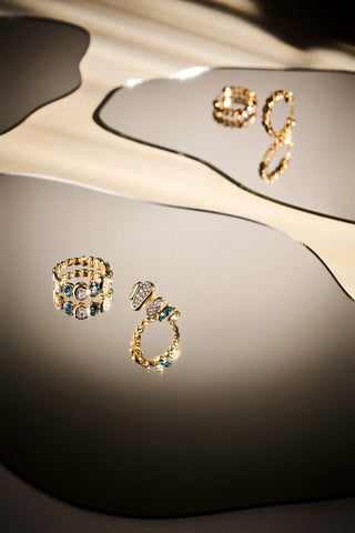 Loops Topaz & Diamond Ring